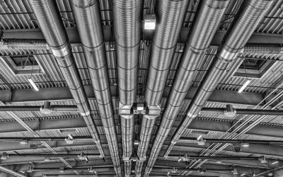 Air conditioning ductwork versus Airius fan solutions for cooling large spaces.