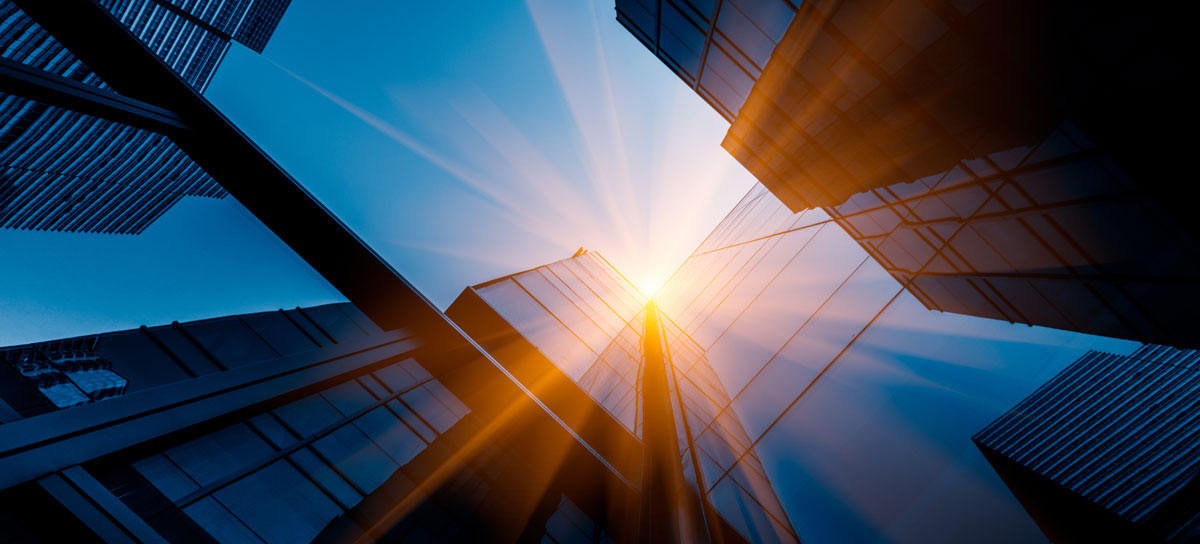 Modern building architecture and sunlight illustrating inhabitant cooling and energy savings.