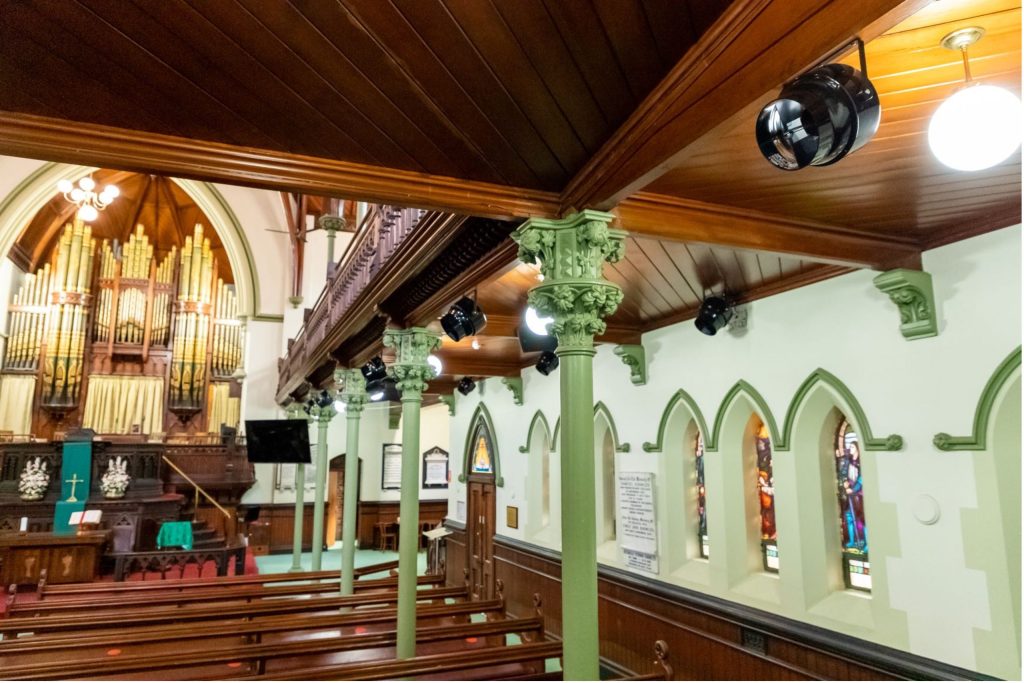 Side-mounted Airius Pearl S1 fans installed in a Brisbane church, providing low-noise air circulation.