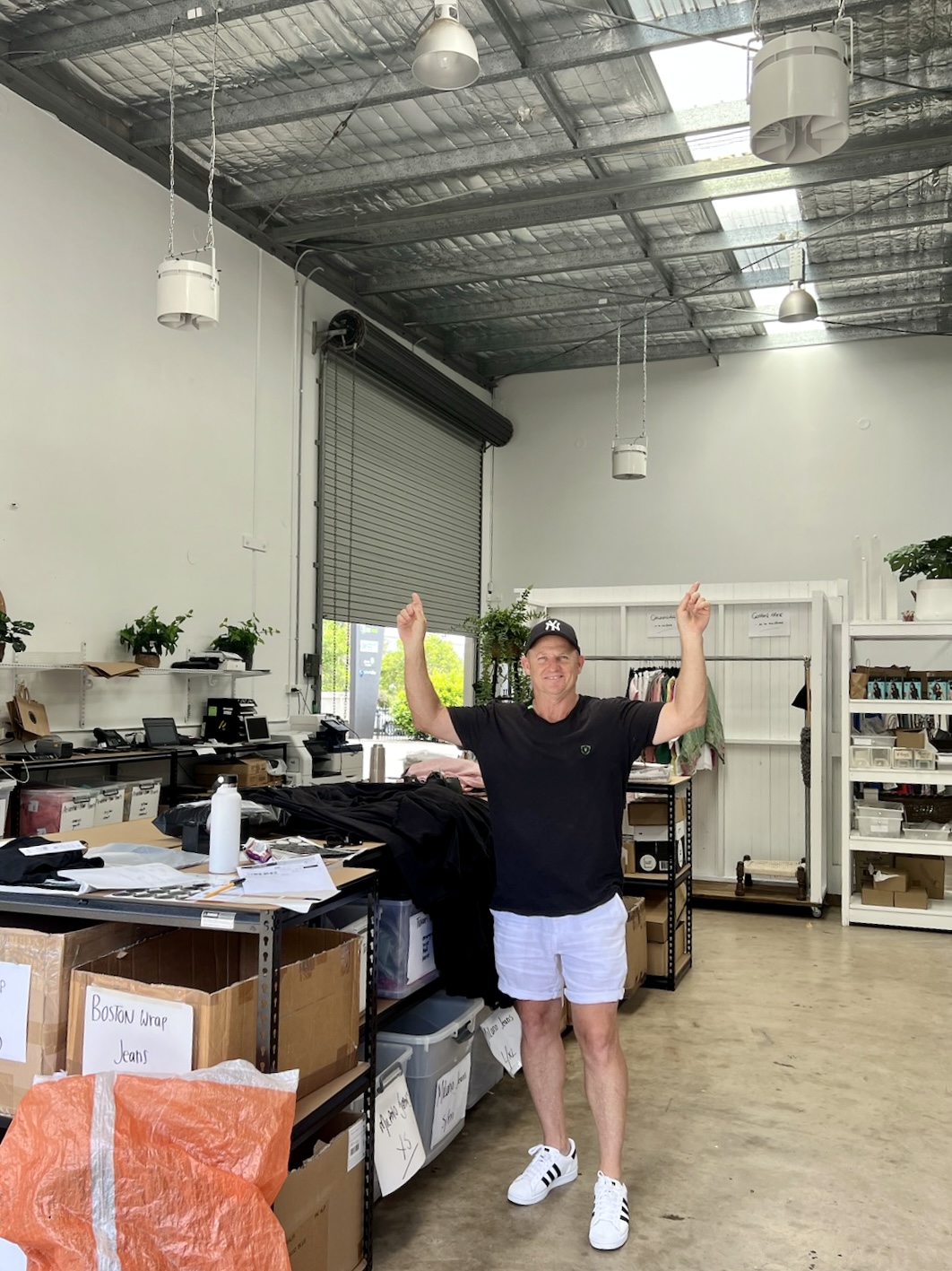 warehouse-cooling-solution-airius-fans Airius Onyx EC fans installed in a large warehouse space, improving airflow and staff comfort.