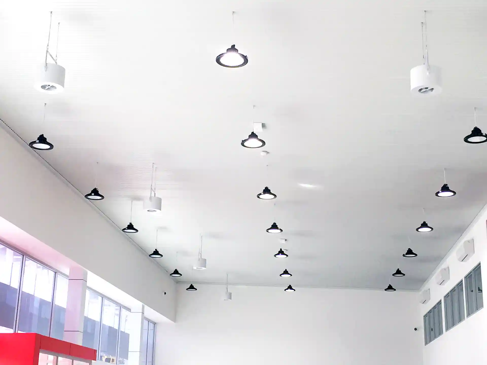 Airius Retail Series fans installed in Toyota Kilmore showroom ceiling, balancing temperature and complementing high