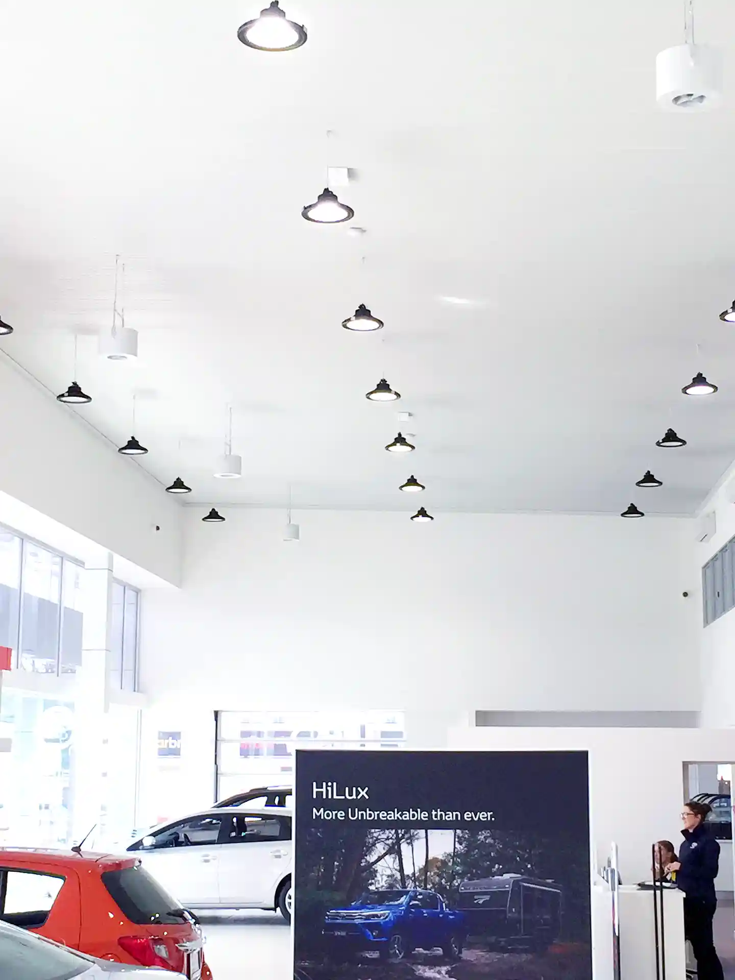 Airius Retail Series fans installed in Toyota Kilmore showroom, balancing temperature and complementing high bay
