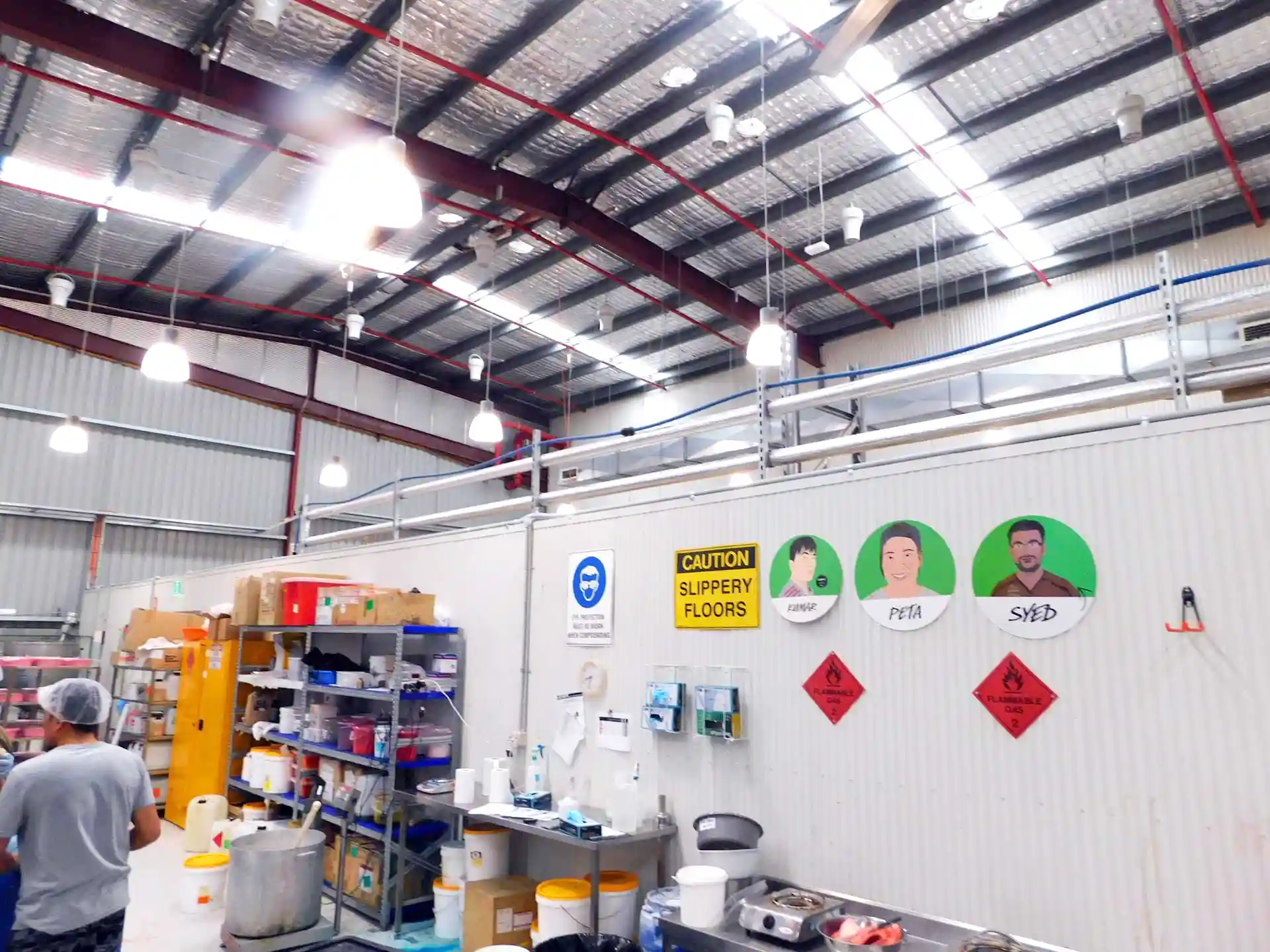 Lush Cosmetics warehouse interior with suspended Airius Air Pear fans improving airflow and cooling.