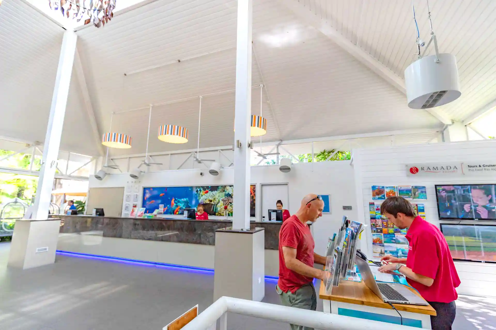 Ramada Inn reception area with Airius Duckbill fan providing targeted cooling and improved airflow.