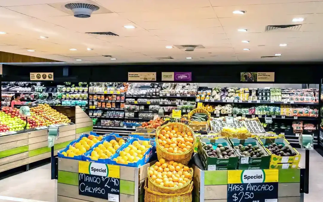 Supermarket produce display showcasing Airius cooling fans for thermal comfort and HVAC efficiency.