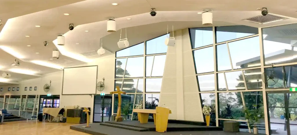 Airius cooling fans installed in Immanuel College multi-purpose hall, improving airflow and comfort for students.
