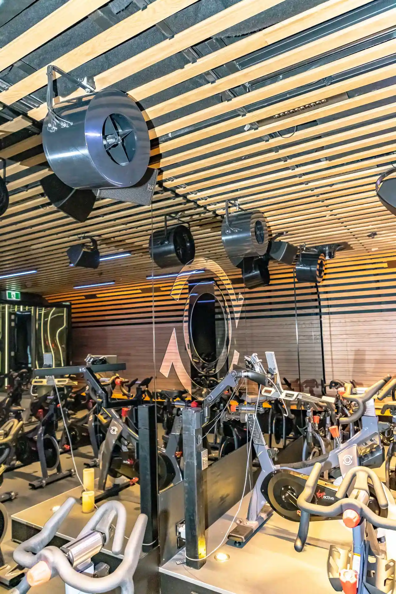 Airius R20EC cooling fans installed in Virgin Active Barangaroo Spin studio, providing multi-directional airflow.