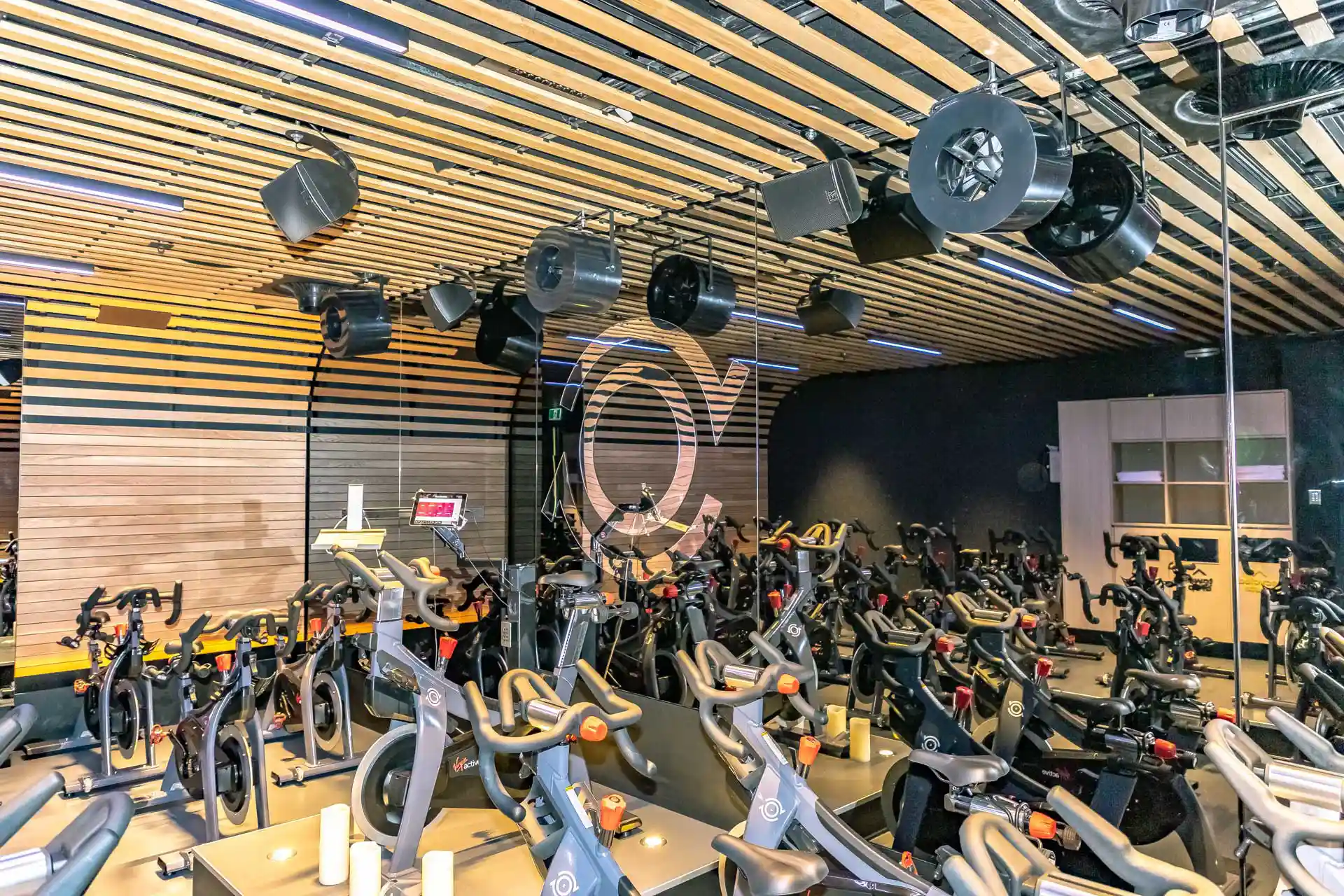Airius cooling fans installation in Virgin Active Barangaroo Spin studio, providing targeted airflow for gym